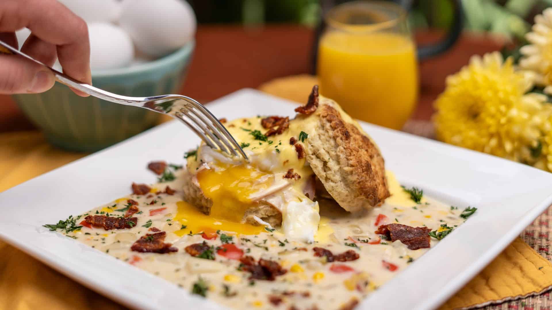 breakfast biscuit and egg on an artfully spread plate of gravy at inn of the turquoise bear