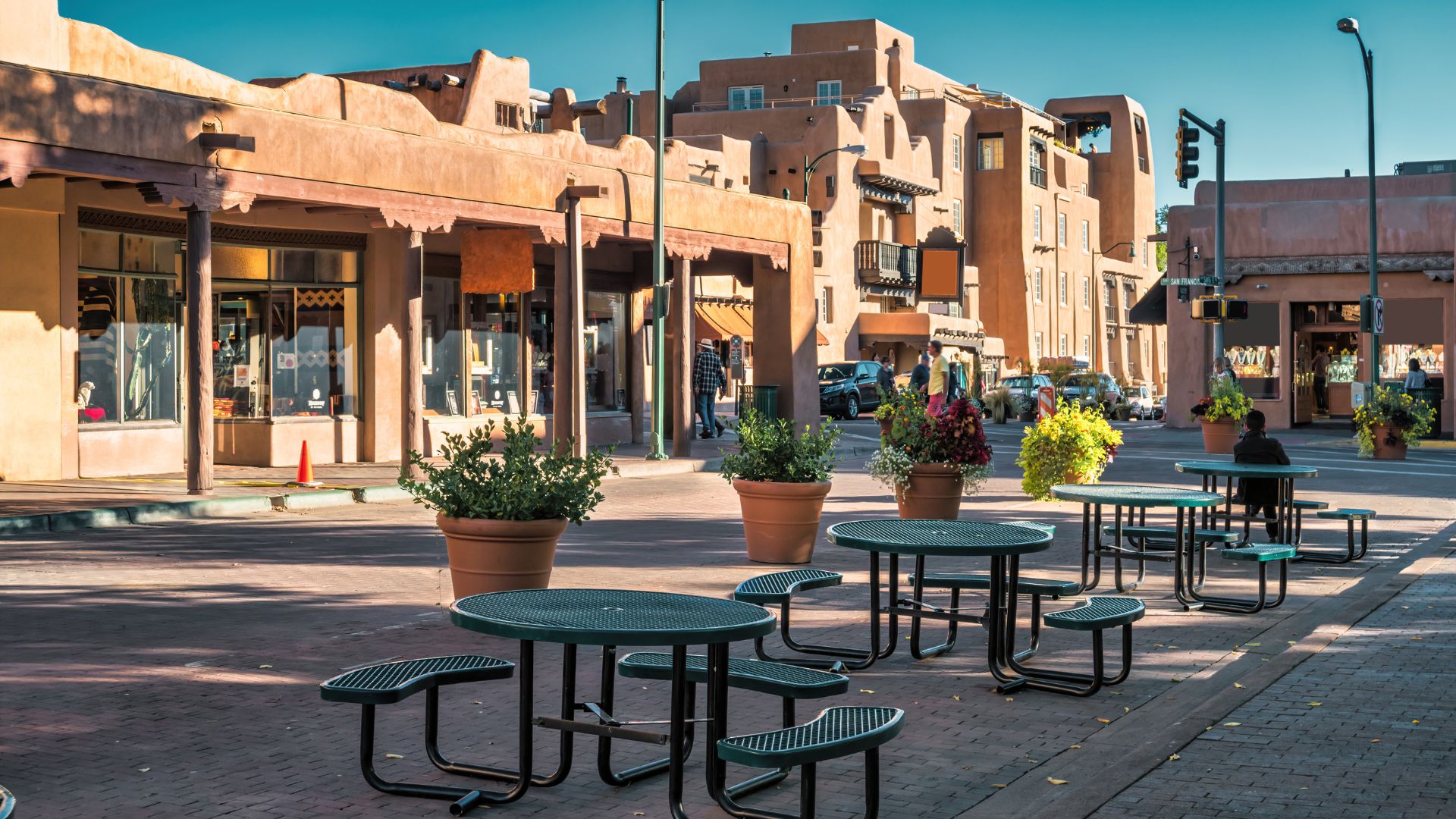 picnic tables out on the cobblestone streets of the santa fe plaza