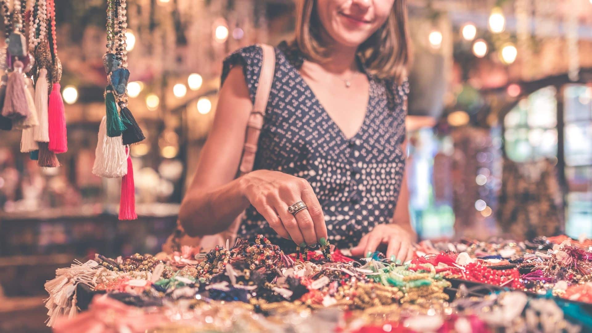 a woman shopping for eclectic jewelry