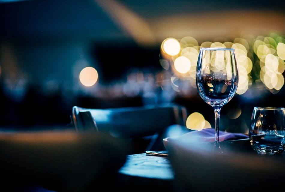 Table set at fine dining restaurant in ambient blue light